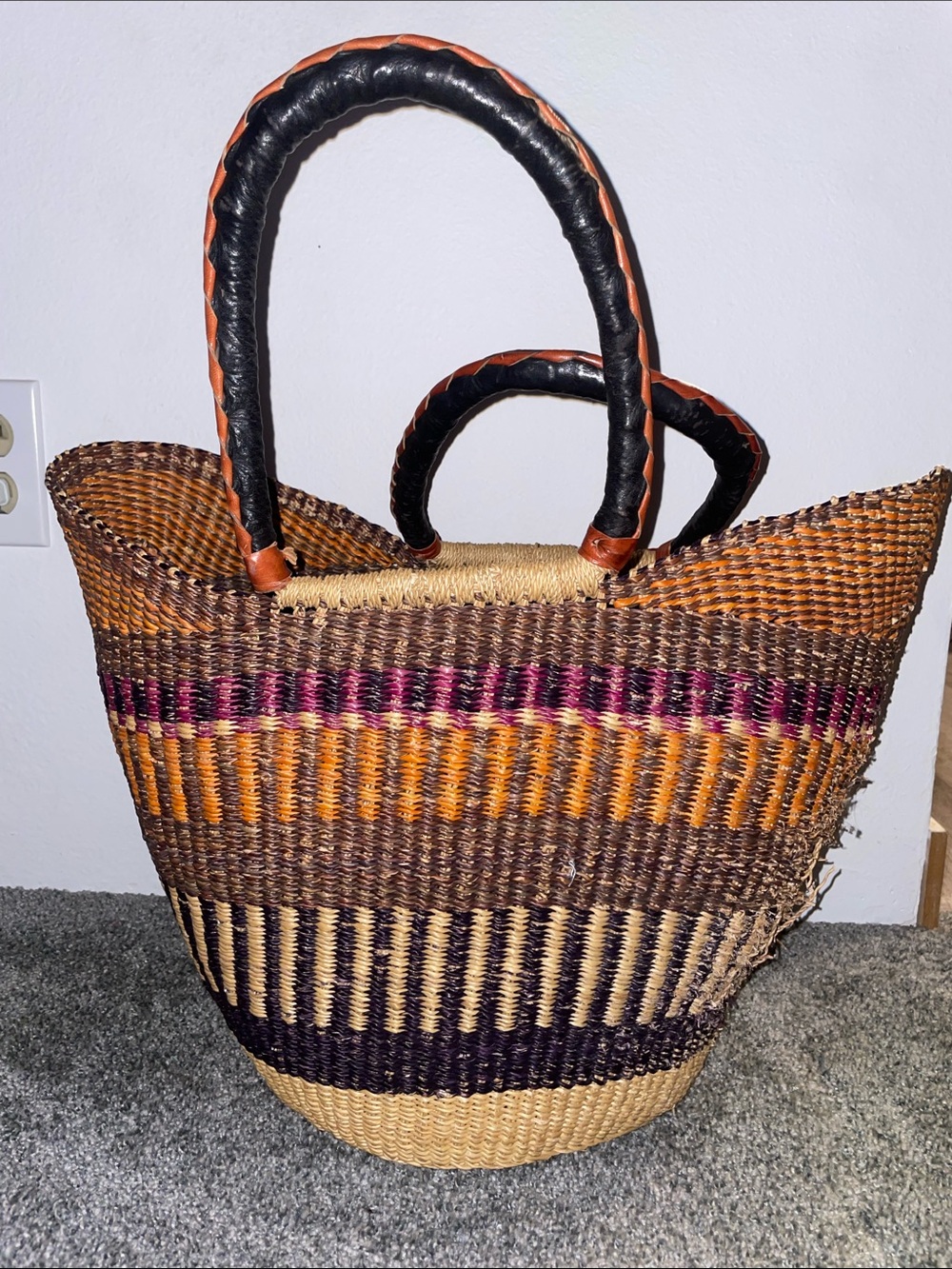 handwoven U-shaped Bolga basket (or market tote) from Ghana